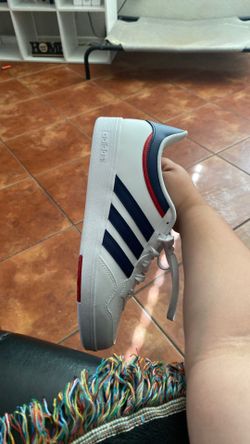 white and blue adidas,  size 9 1/2