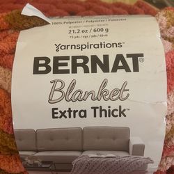 4 Unopened Rolls Bernat Yarn