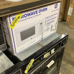 GE 1.1 cu. ft. Countertop Microwave in White