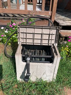 winding hose cart with hose and nozzle