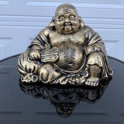 The Golden Squatty Buddha Statue