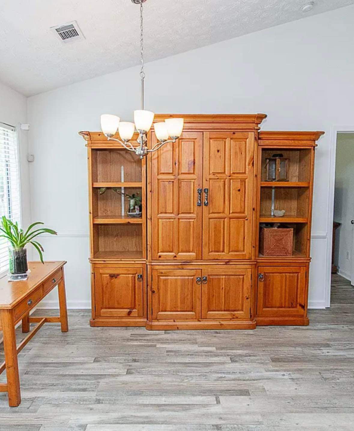 Three Piece Cabinet With Lighted Bookcases