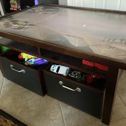 Pottery barn table with bins and toys