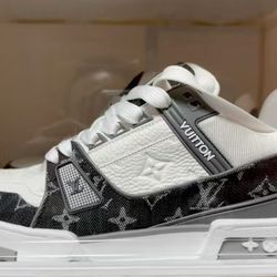 Louis Vuitton trainer in gray and white color scheme