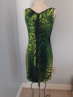 BEAUTIFUL GENTLY USED DRESS BY ELIE TAJARI SIZE 4
