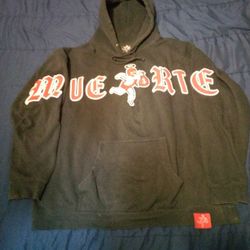 Black Hoodie From The Street Wear Brand Hasta Muerte. And Features A Graphic Of A Winged Cherub. Men's Wear. XL.