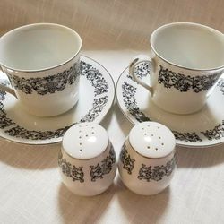 Ekco Porcelain Teacups, Saucers, and Salt and Pepper Shakers

