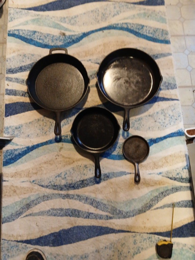 4 Old Different Size Cast Iron Pans