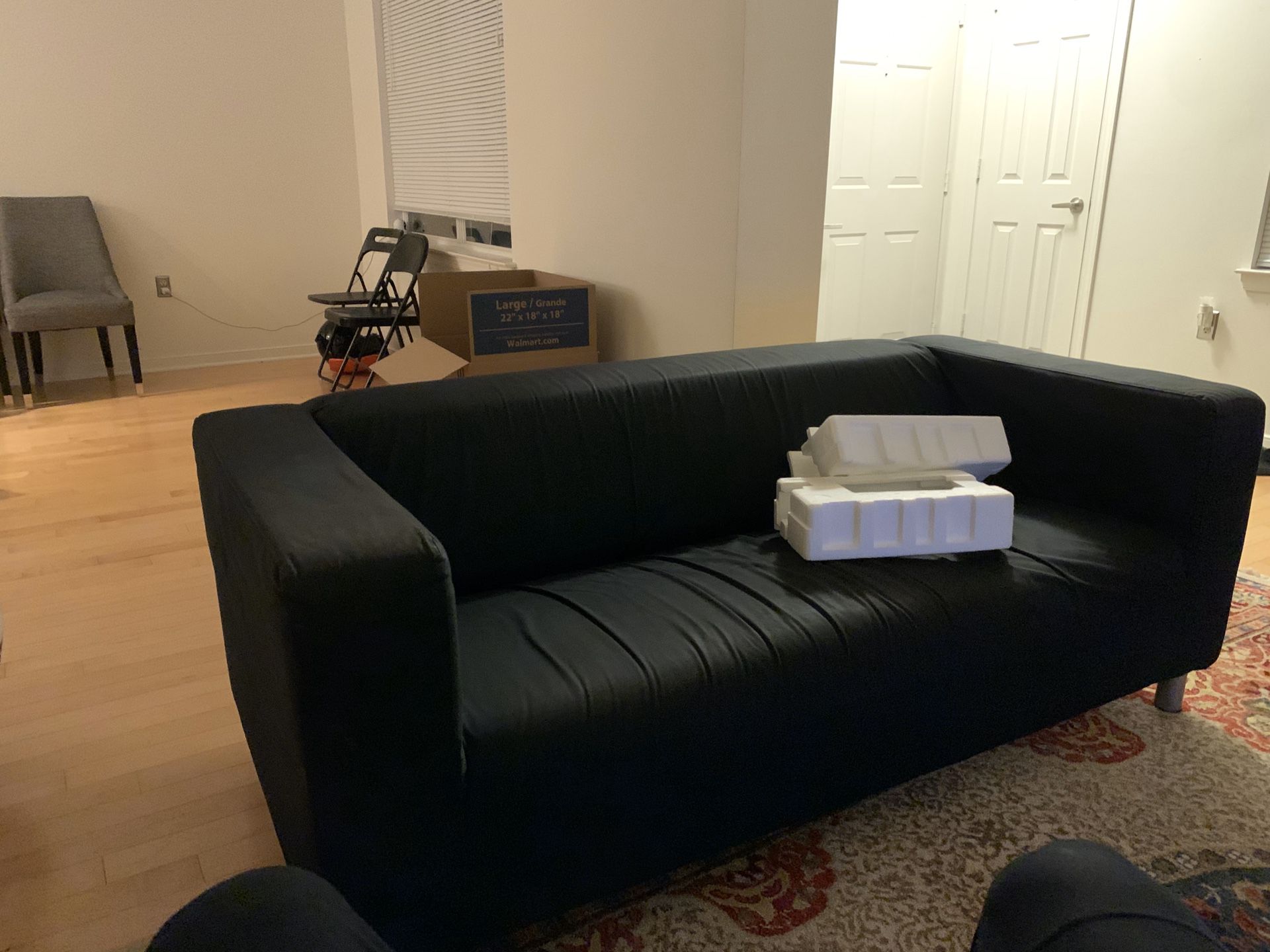 Black couch with removable cover