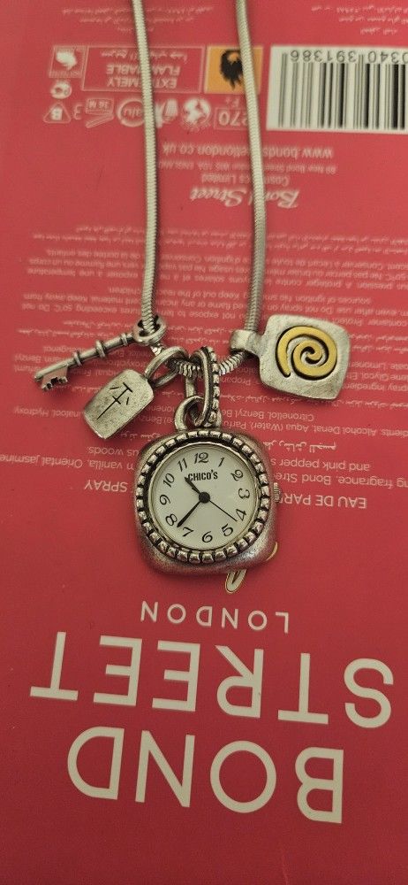 Slightly used silver necklace with a Watch
