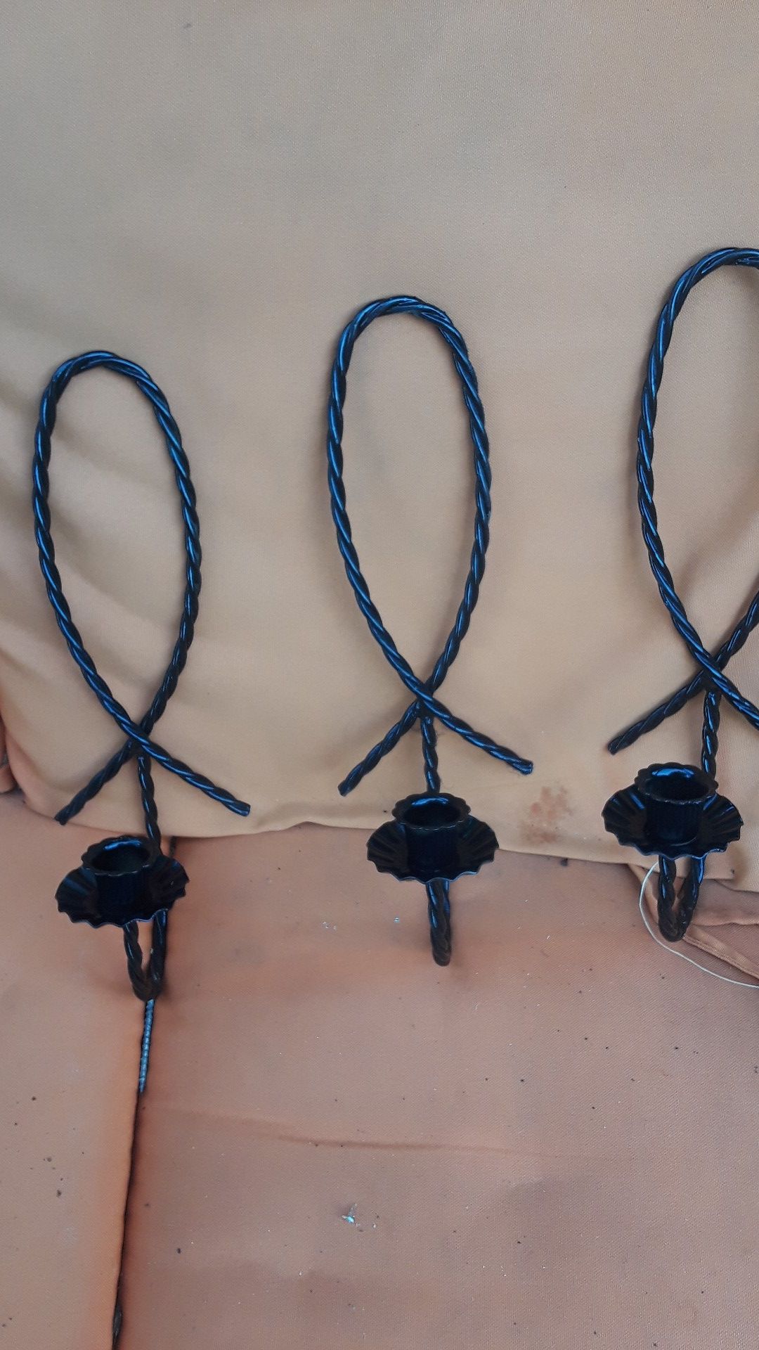Have three candle sconces