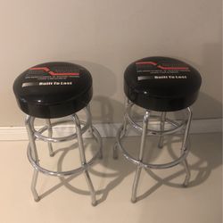 Borg Warner Swivel Stools. Black And Silver
