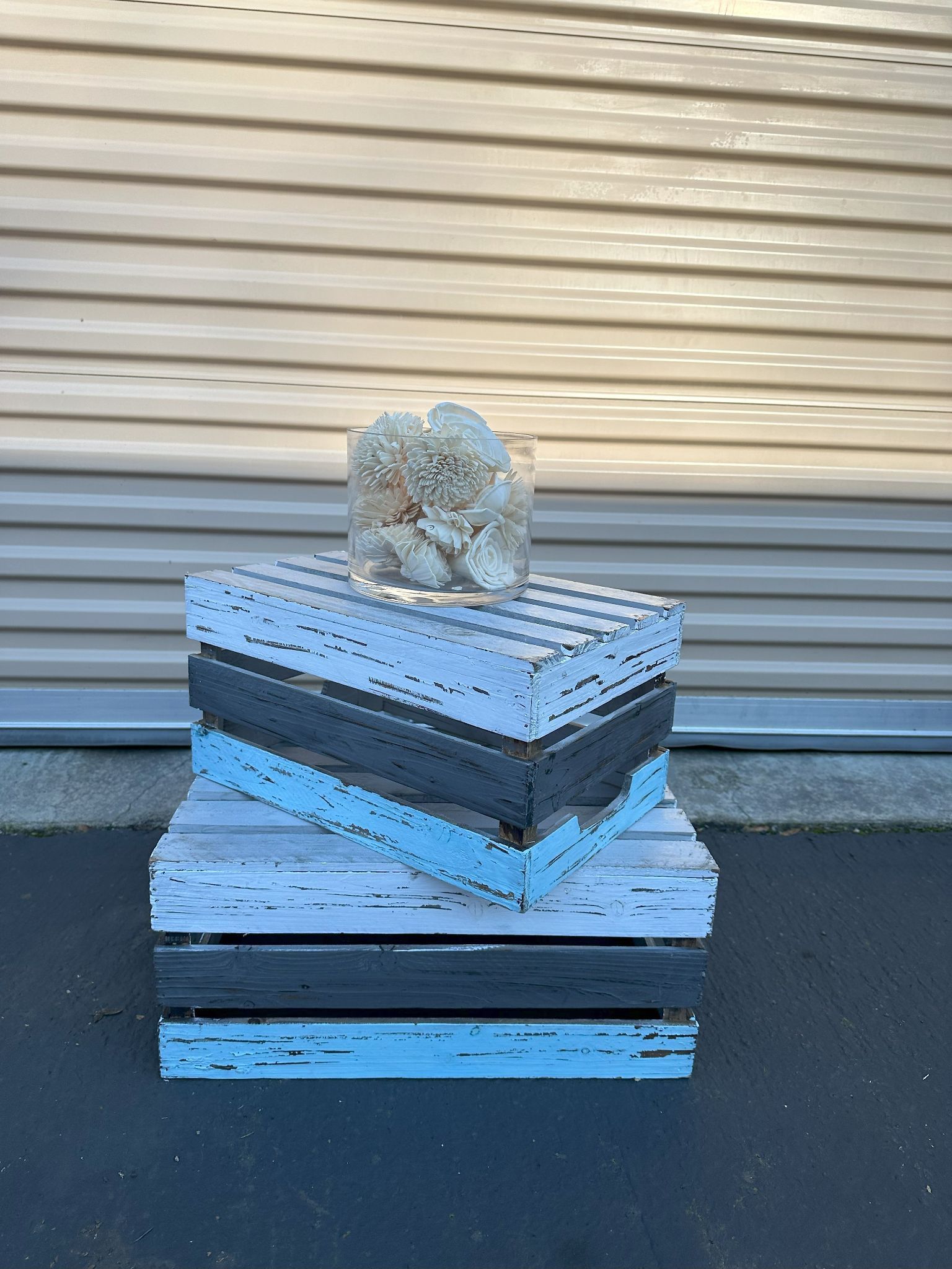 Fake White Flower Heads In A Glass Vase