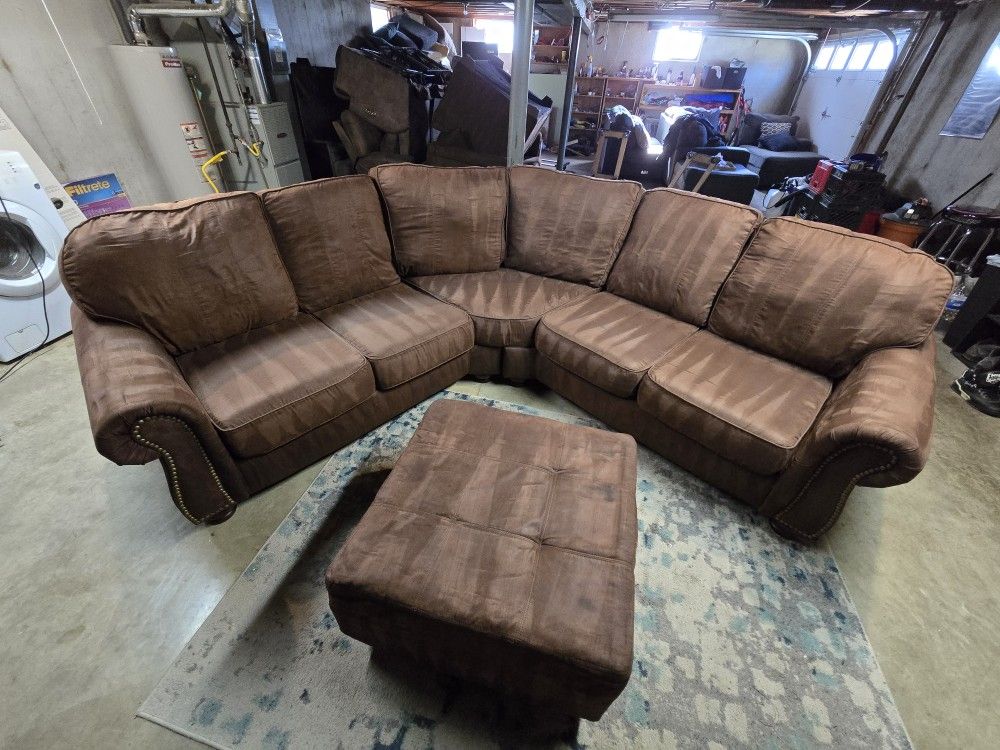 Ashley Brown Microfiber Suede 2-Piece Sectional with Nailhead Accents + Ottoman