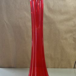 This item is a vintage L.E. Smith red glass swung vase, a popular piece of Mid-Century Modern art glass