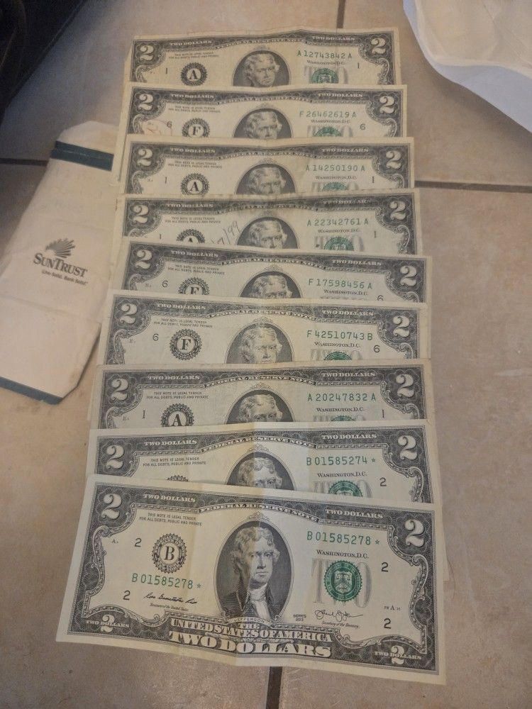 8 Two Dollars Bills 