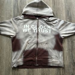 Grey and brown Glock hoodie with a streetwear