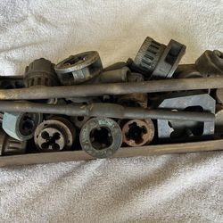 Pipe dies, older style 1 1/4 down some new some used all good
