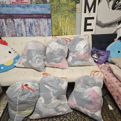 6 Huge Bags Of Clothes