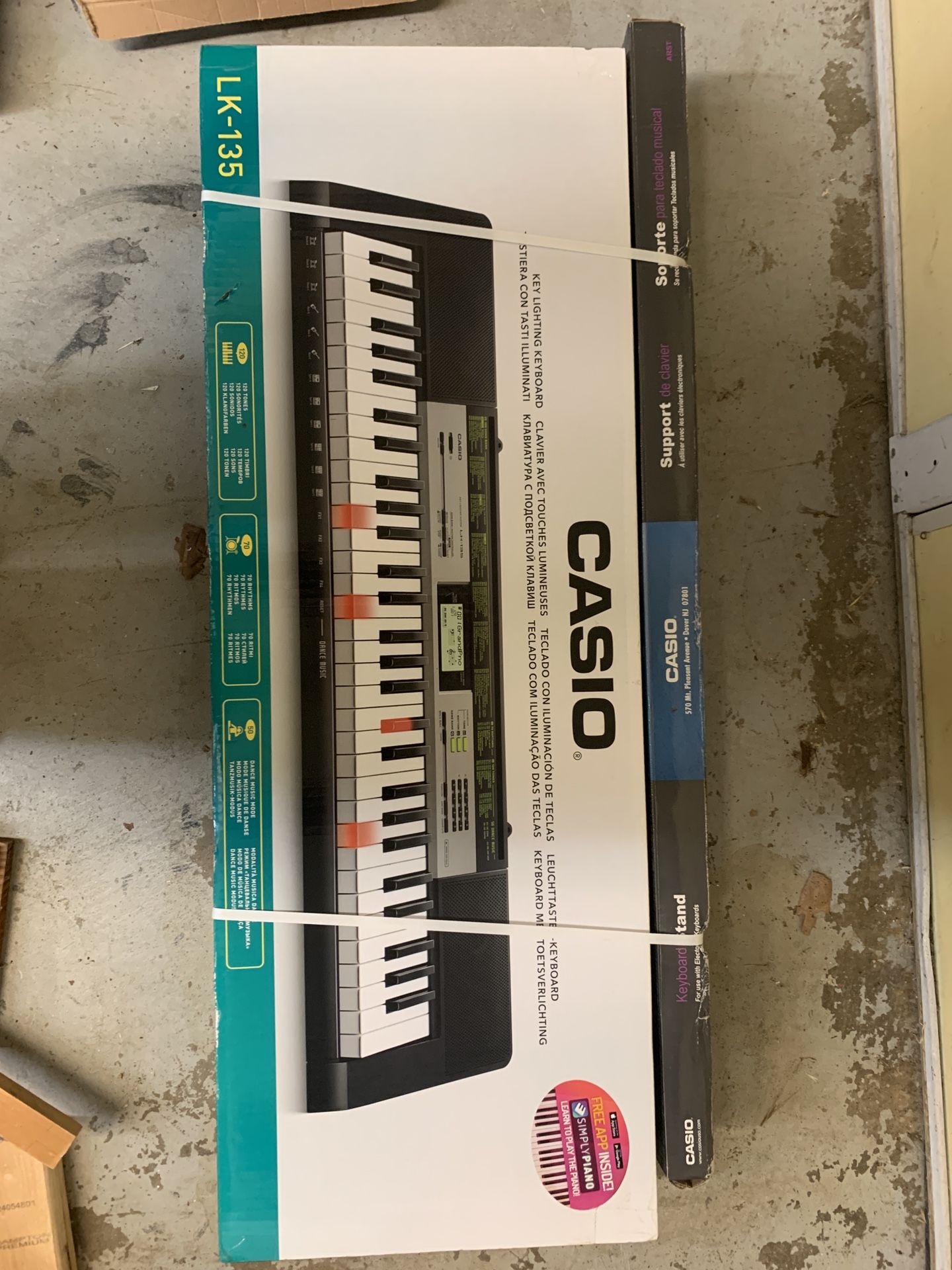 New In The Box Casio LK-135 Keyboard Piano With Stand
