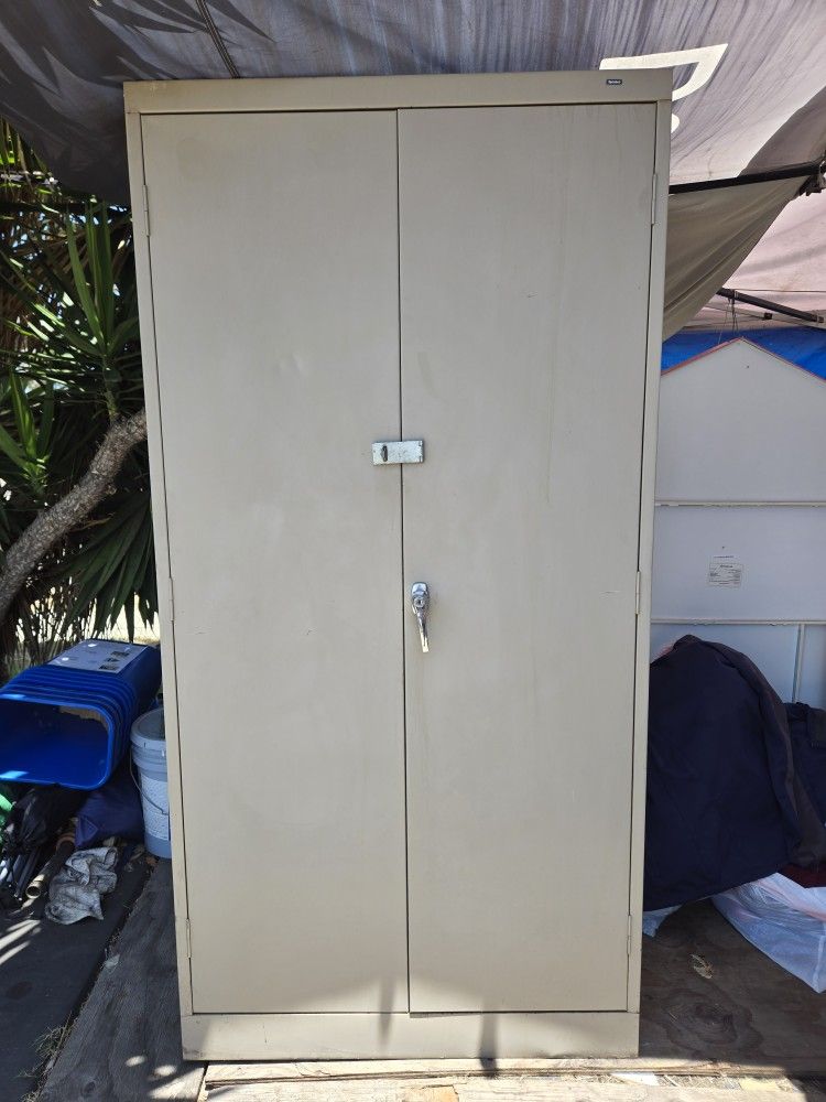 Tan Color Tennsco Metal Storage Cabinet With 2Keys