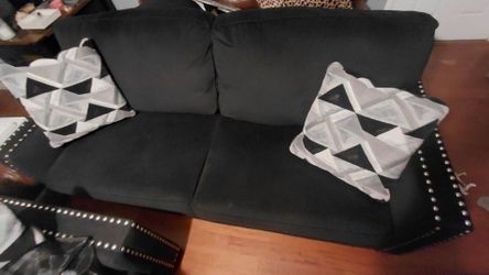 Black suede couch and love seat. Very nice
