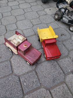 Vintage pressed steel and plastic toy truck from the 1960s.