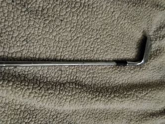 Palo de golf.