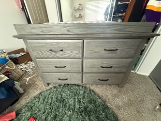 Dresser for baby with changing topper
