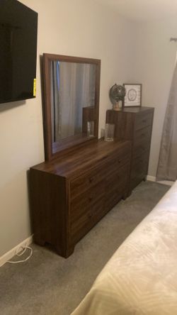 Wood dresser and wood vanity with mirror and matching nightstand