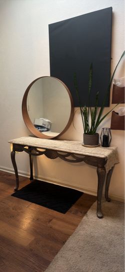 Console table with stone and glass top