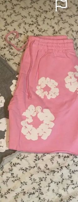 Pink denim tear shorts