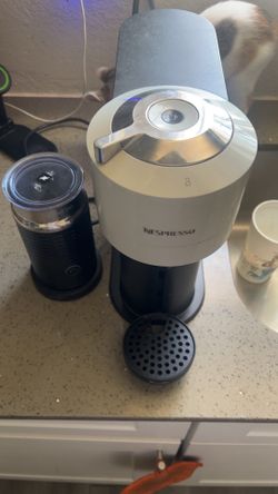 Nespresso vertio machine with milk frother