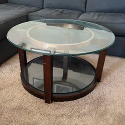 Round Glass Coffee Table – Dark Wood Base (Mor Furniture)