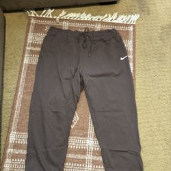2 pairs of Nike sweatpants