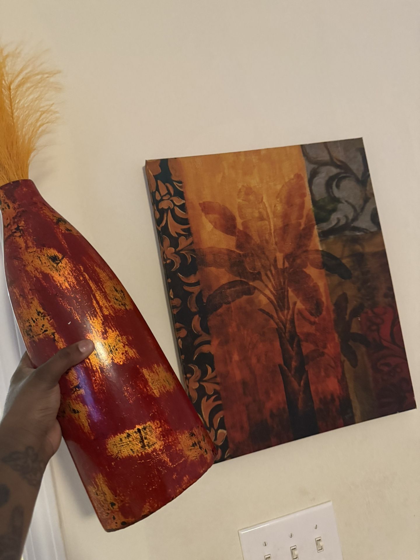 Wall Portrait And Vase 
