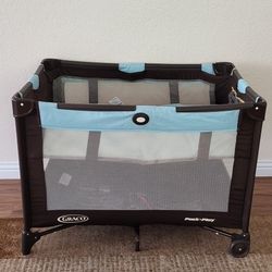 Practically New Graco Baby Playpen ( Used Once). Price Firm!