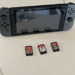 Nintendo Switch + 3 games 