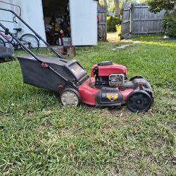 21" Toro Self-propeled Lawn Mower. With Bag. Front Tires A Little Worn But The Old Girl Runs Like A Banshee!!$33.00obo. 