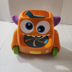 Fisher-Price Zoom 'n Crawl Monster Orange Spinning Crawling Musical Toy