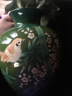 Beautiful vase with artificial flowers. OBO