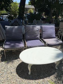 Patio metal chairs midcentury style with wooden coffee table