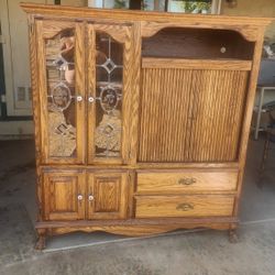 Old entertainment center and there old dresser