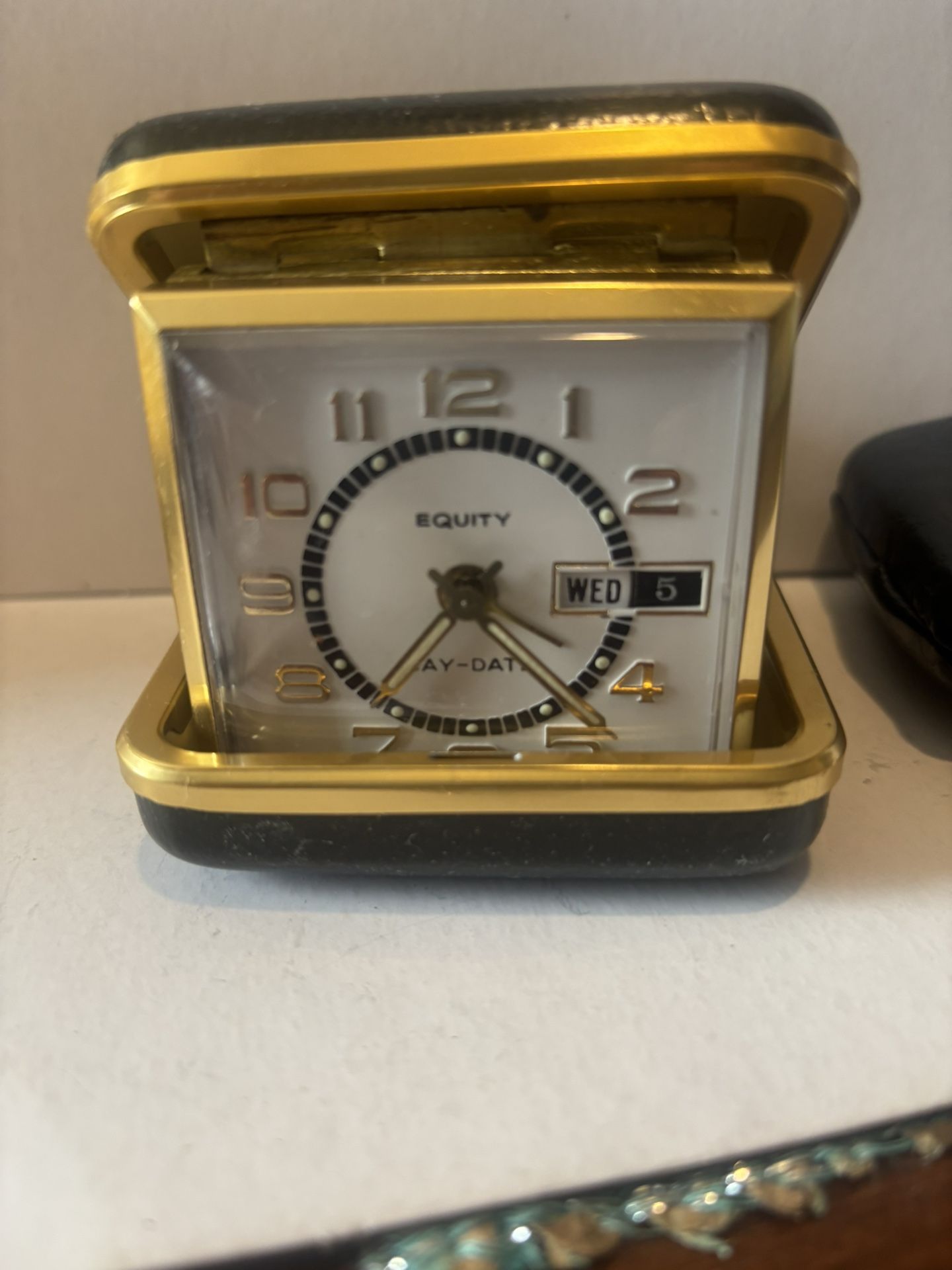 Equity Day-Date Travel Clock