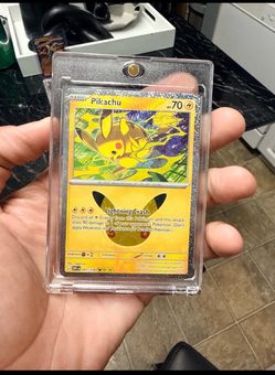 Pikachu (051/128) holographic trading card from the Pokémon TCG: 30th Celebration collection.