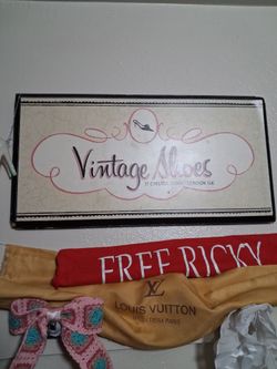 Sign. Says vintage shoes chelsea london