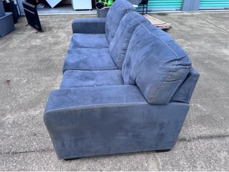Blue suede sofa