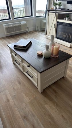 Pop up coffee table with drawers