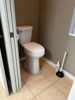 Two  KOHLER toilets