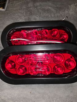 Red Oval LED Trailer Tail Lights Pair